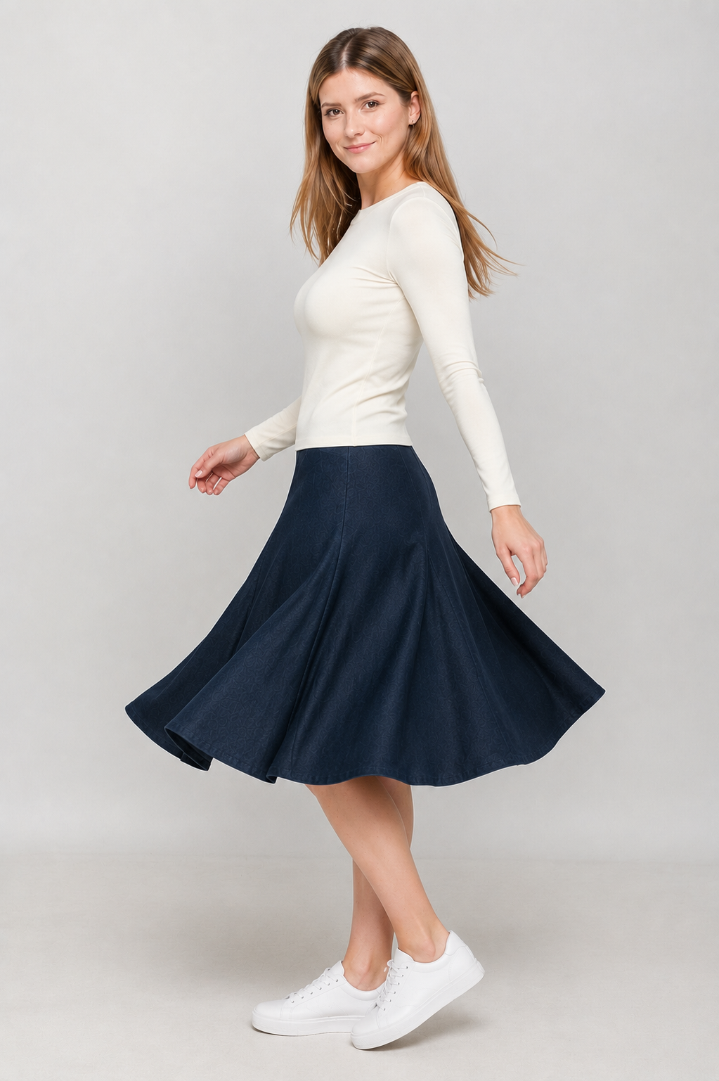 Style 2617 Navy Denim panel skirt movement view